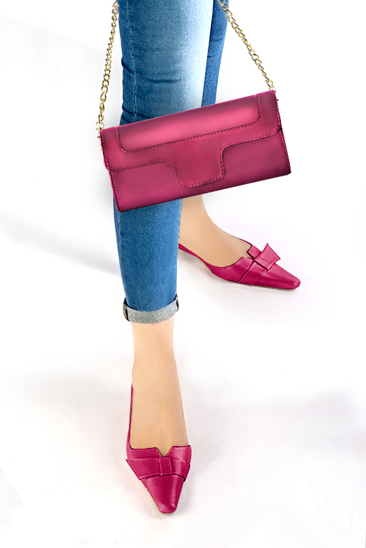 Women's fuchsia pink luxurious elegant clutch for ceremonies, weddings and evenings out. - Worn view